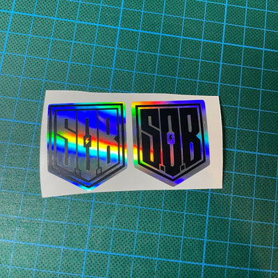 Sons of Battery® - E-MTB Brand & Community Folien und Sticker SoB Supporter Folie (3.7x3.2 cm) Holografische / Oilslick Effekt Sticker - SoB - E-Bike-Community