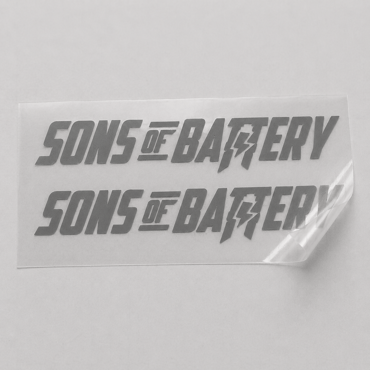 Sons of Battery - E-MTB Brand & Community Folien Grau / 9 x 1.6 cm Sons of Battery - Schriftzug Modern E-Bike-Community